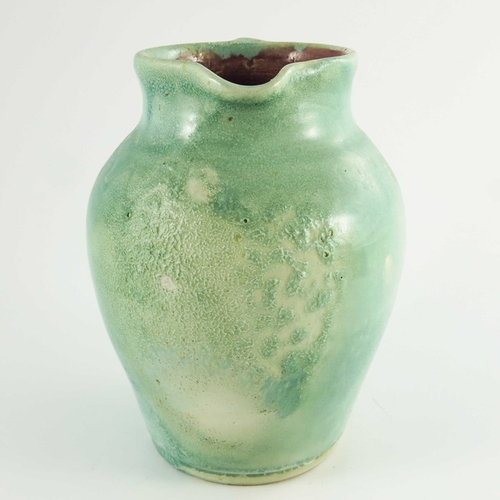 1264 - William Fishley Holland, an art pottery jug, circa 1930, green glazed shouldered form, incised signa... 