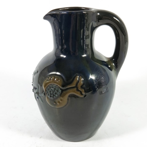 1267 - Edmund Harry Elton for Sunflower Pottery, an Elton Ware jug, shouldered form, relief moulded with po... 