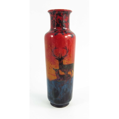 1331 - Charles Noke for Royal Doulton, a Sung glazed vase, circa 1920, painted with deer standing beneath a... 