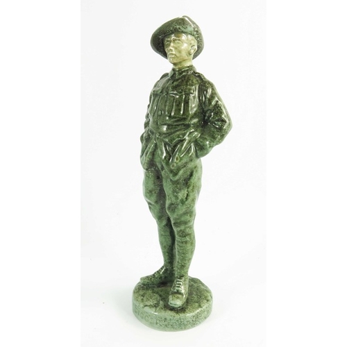 1338 - A Royal Doulton figure Digger, circa 1920, model of a World War One Australian soldier in a Titanian... 