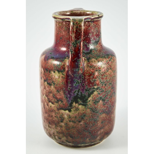 1342 - A Ruskin high fired twin handled vase, circa 1925, cylindrical shouldered form with angled handles, ... 