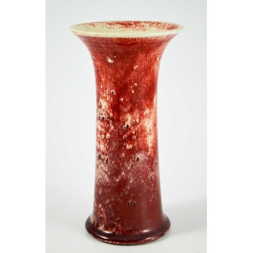 1347 - A Ruskin high fired vase, circa 1920, waisted form, white draining to red with speckled inclusions, ... 