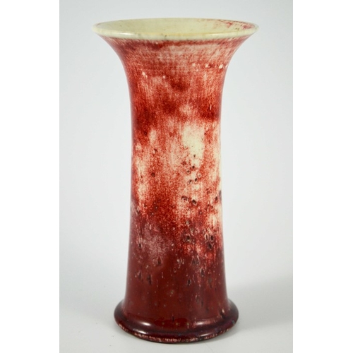 1347 - A Ruskin high fired vase, circa 1920, waisted form, white draining to red with speckled inclusions, ... 