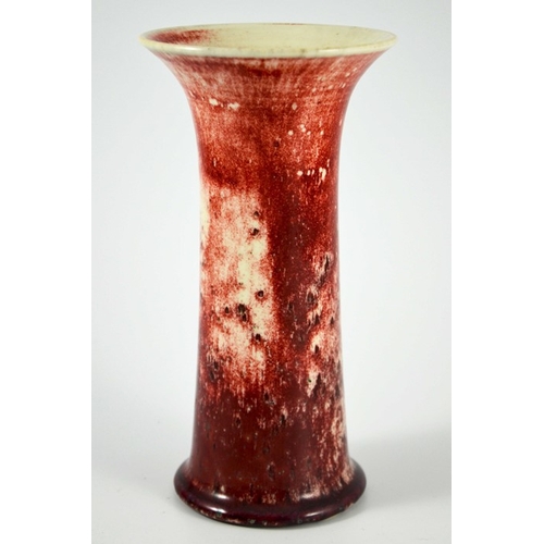 1347 - A Ruskin high fired vase, circa 1920, waisted form, white draining to red with speckled inclusions, ... 