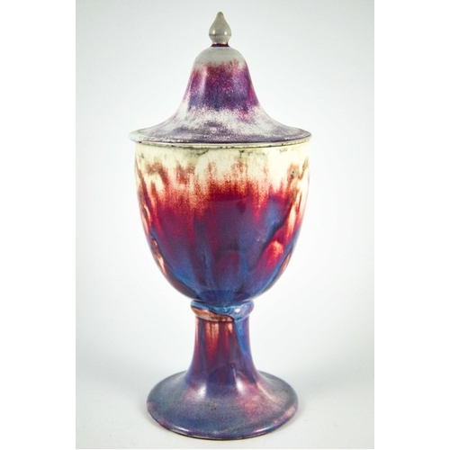 1348 - A large Ruskin high fired pedestal vase and cover, 1924, rounded cup or chalice form with ogee domed... 