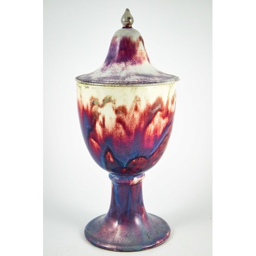 1348 - A large Ruskin high fired pedestal vase and cover, 1924, rounded cup or chalice form with ogee domed... 