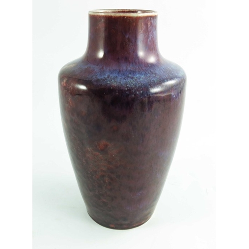 1361 - A Ruskin high fired vase, 1924, shouldered form, red and purple glaze, impressed marks, 25cm high