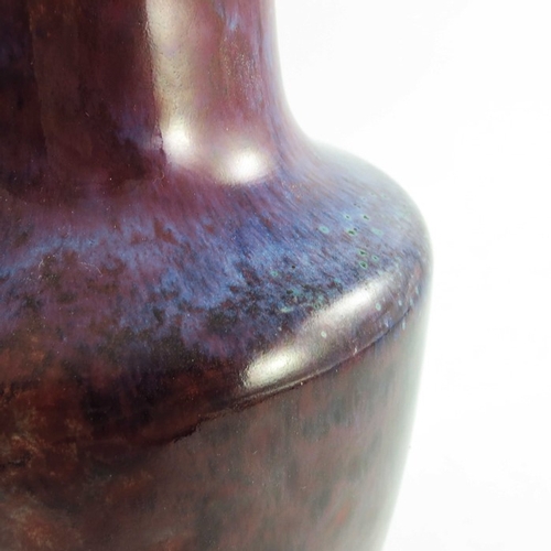 1361 - A Ruskin high fired vase, 1924, shouldered form, red and purple glaze, impressed marks, 25cm high