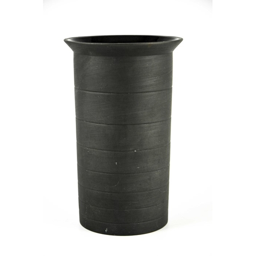 1397 - Nick Munro for Wedgwood, a black basalt cylinder vase, 1999, incised concentric ring decoration and ... 