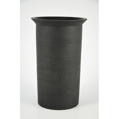 1397 - Nick Munro for Wedgwood, a black basalt cylinder vase, 1999, incised concentric ring decoration and ... 