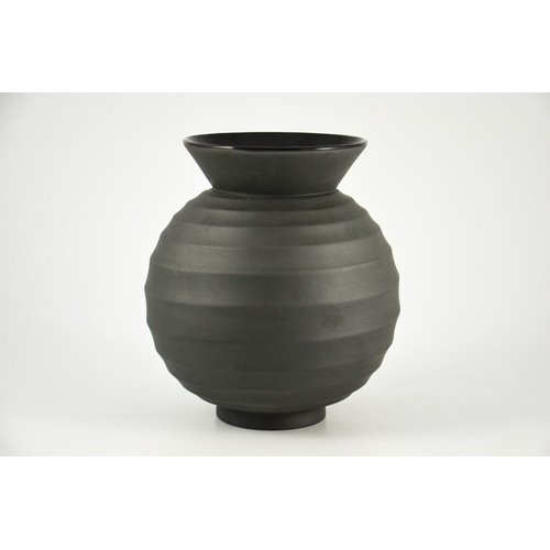 1398 - Nick Munro for Wedgwood, a black basalt vase, 1999, fluted spherical form with conical flared rim, p... 