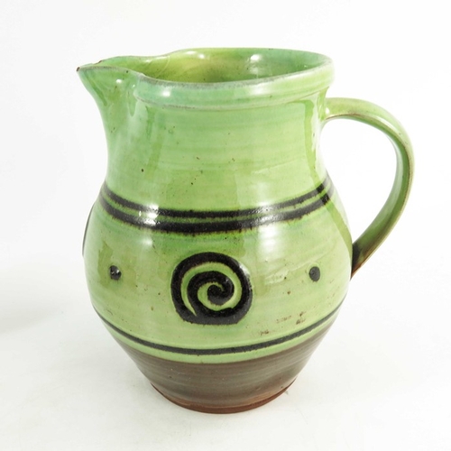 1405 - Sid Tustin for Winchcombe, three graduated studio pottery slip glazed jugs, spiral, line and wave de... 