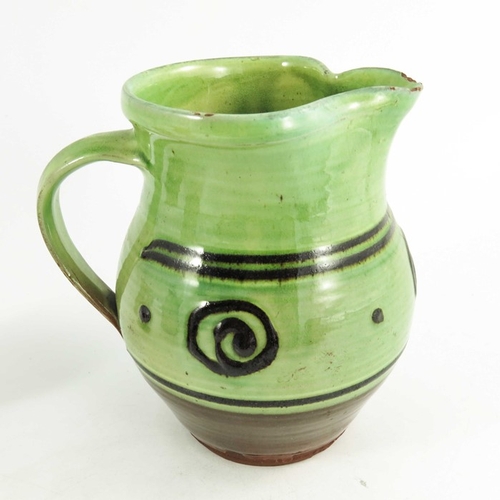 1405 - Sid Tustin for Winchcombe, three graduated studio pottery slip glazed jugs, spiral, line and wave de... 