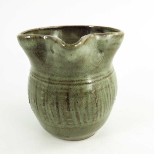 1411 - Michael Cardew for Wenford Bridge, a studio pottery jug, incised with a band of vertical combed stri... 