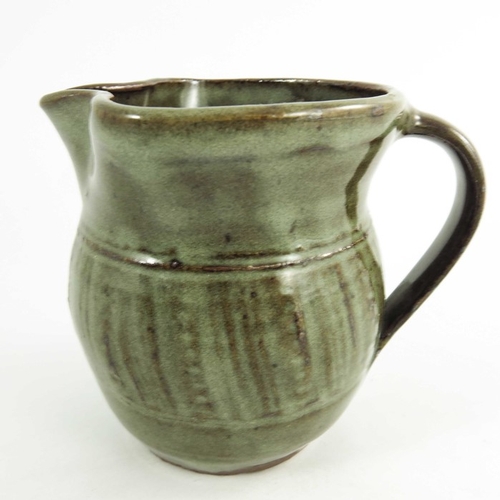 1411 - Michael Cardew for Wenford Bridge, a studio pottery jug, incised with a band of vertical combed stri... 