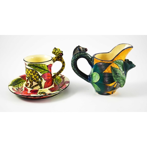 1413 - Ardmore Studio, a South African pottery jug and coffee can and saucer, 2000 and 2008, relief moulded... 