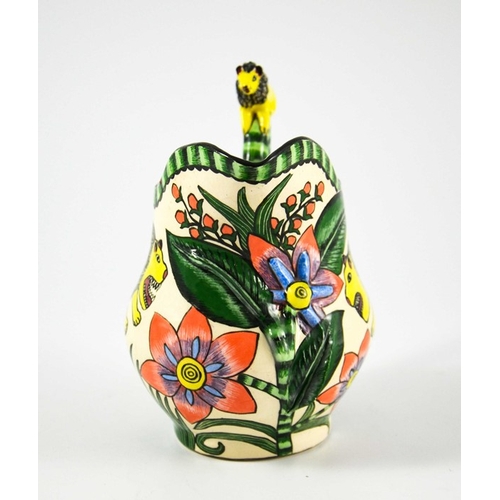 1414 - Ardmore Studio, a South African pottery jug, 2002, relief moulded and painted with lions and flowers... 