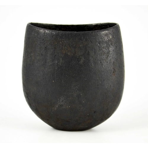 1433 - John Ward, a studio pottery vase, flattened ovoid form, black glazed, impressed seal mark, 12cm high