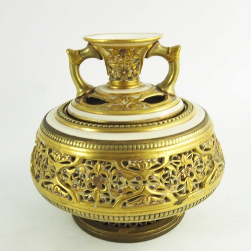 1444 - A Royal Worcester reticulated potpourri vase, circa 1882, relief moulded and pierced with Persian st... 