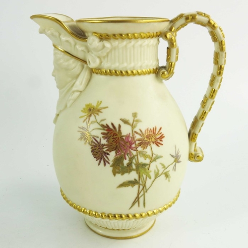 1452 - A Royal Worcester blush ivory ground jug, 1890, the compressed ovoid body flanked by a scroll handle... 