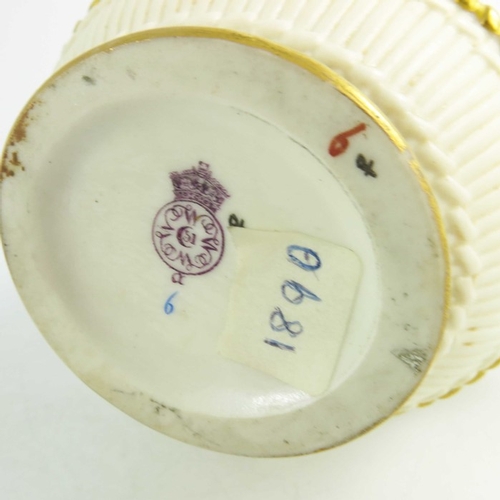 1452 - A Royal Worcester blush ivory ground jug, 1890, the compressed ovoid body flanked by a scroll handle... 