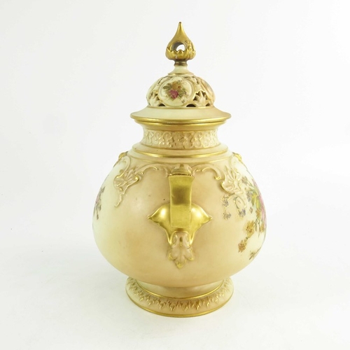 1458 - A Royal Worcester blush ivory ground globular pot pourri two handled jar and cover, decorated with d... 