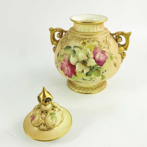 1459 - A Royal Worcester blush ivory ground globular pot pourri two handled jar and cover, decorated with r... 