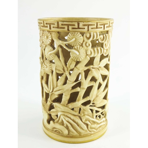 1461 - A Royal Worcester reticulated and relief moulded vase, 1907, modelled as a Chinese brush pot, ivory ... 