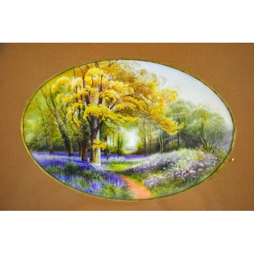 1469 - R. Rushton for Royal Worcester, a hand painted oval porcelain plaque 'Bluebells, Kew Gardens', signe... 