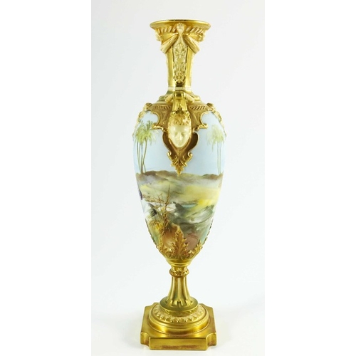 1472 - Walter Powell for Royal Worcester, a mask handle vase of slender ovoid form, painted with storks in ... 