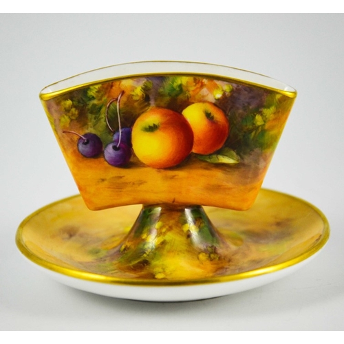 1479 - A. Shuck for Royal Worcester, a hand painted and gilded cigarette holder, 1934, decorated with fruit... 