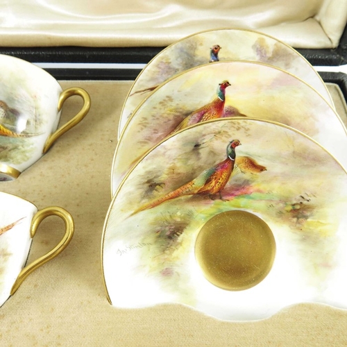 1496 - James Stinton for Royal Worcester, a boxed set of six Pheasant painted cups and saucers, 1926, each ... 