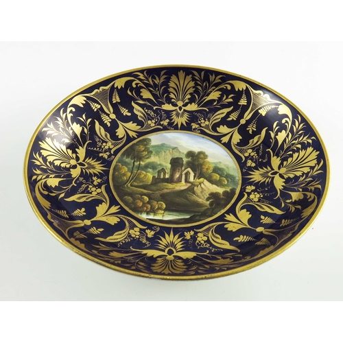 1501 - A Derby Saucer Dish circa 1825, the cobalt blue ground deep border with gilt leaf and scroll decorat... 