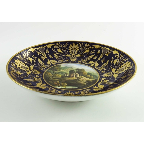 1501 - A Derby Saucer Dish circa 1825, the cobalt blue ground deep border with gilt leaf and scroll decorat... 