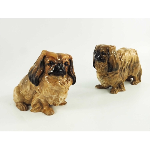 1506 - Two Royal doulton figures, large seated pekingnese HN1039 and large standing pekingese HN1011, print... 