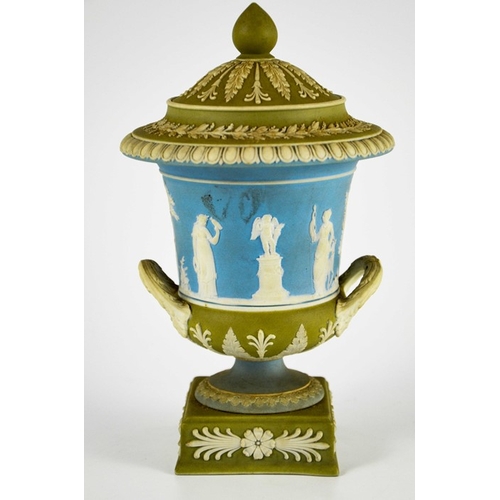 1515 - A Wedgwood tri colour Jasperware vase and cover, twin handled Campana urn form, circa 1840, white on... 