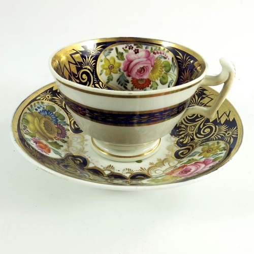 1517 - Two English cups and saucers, one Coalport, circa 1840, painted with floral sprays, blue ground with... 