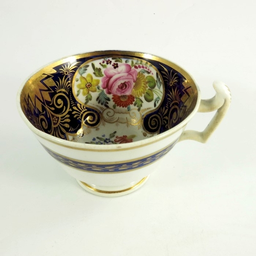 1517 - Two English cups and saucers, one Coalport, circa 1840, painted with floral sprays, blue ground with... 