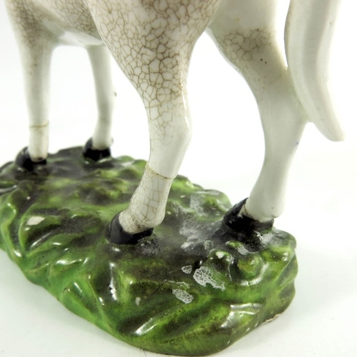 1537 - A Derby porcelain figure of a horse, circa 1770, modelled standing, 10cm high