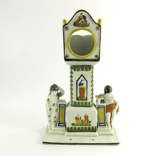 1562 - A Dixon, Austin and Co., Sunderland Prattware watch holder, circa 1810, modelled as a longcase clock... 