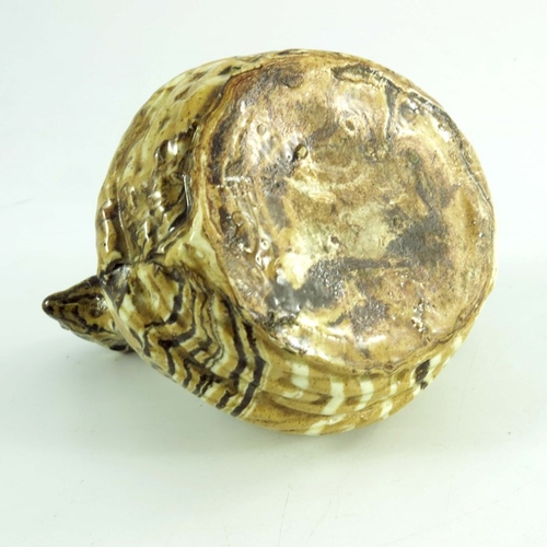 1566 - A Staffordshire agate ware money box, modelled as a hen, circa 1820, sitting in a basket, 10cm high