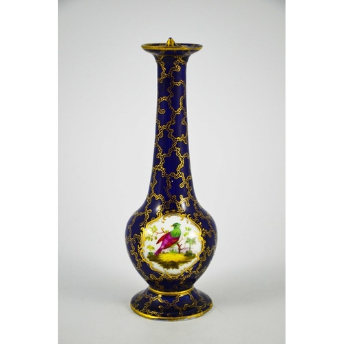 1576 - A porcelain sprinkler bottle, elongated baluster form with ogee foot, gilt over blue seaweed ground ... 