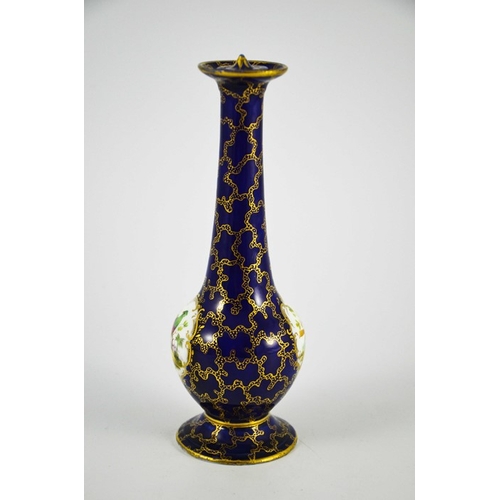 1576 - A porcelain sprinkler bottle, elongated baluster form with ogee foot, gilt over blue seaweed ground ... 