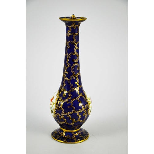 1576 - A porcelain sprinkler bottle, elongated baluster form with ogee foot, gilt over blue seaweed ground ... 