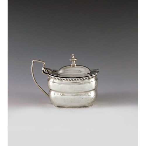 2026 - Charles Chesterman II, London 1808, a George III oval silver mustard pot with moulded girdle and gad... 