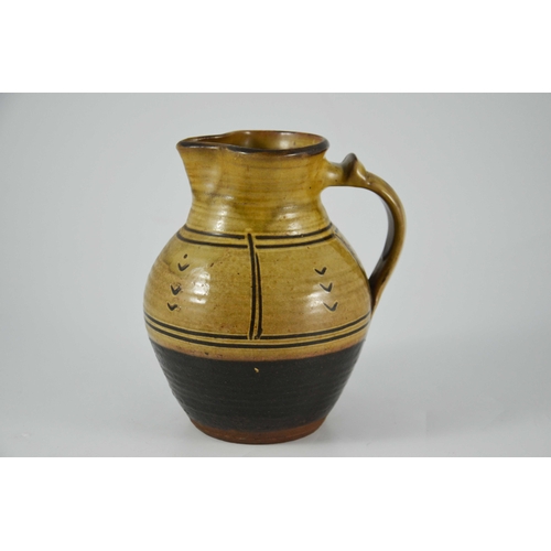 1408 - Michael Cardew for Winchcombe, a studio pottery slipware jug, ovoid form, panel and chevron design, ... 