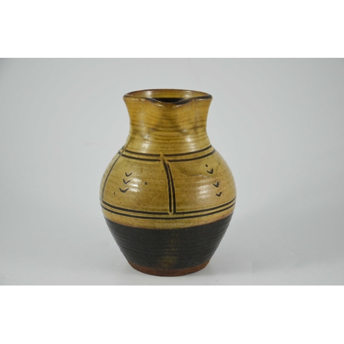 1408 - Michael Cardew for Winchcombe, a studio pottery slipware jug, ovoid form, panel and chevron design, ... 