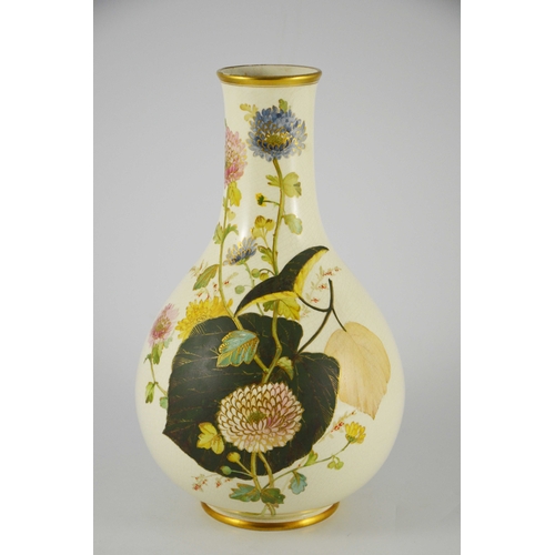 1515a - A Wedgwood baluster vase decorated in coloured enamels on a cream ground, the pair to this vase is i... 