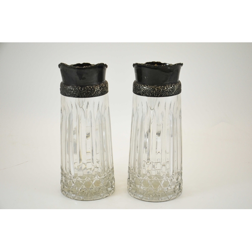 11 - A pair of white metal mounted cut glass beer or lemonade jugs, probably German, circa 1920s, conical... 