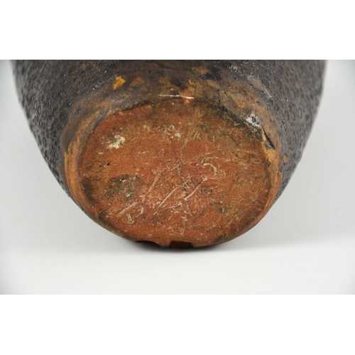 1409 - Michael Cardew for Winchcombe, a studio pottery hanging planter, incised stylised floral motif, burs... 